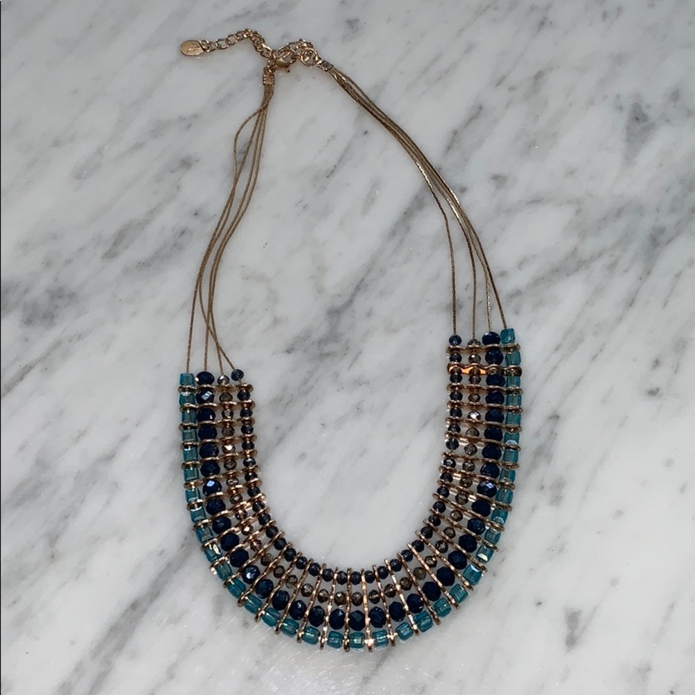Gold necklace with blue beading